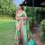 Traditional lemon green silk blend saree with vibrant floral motifs
