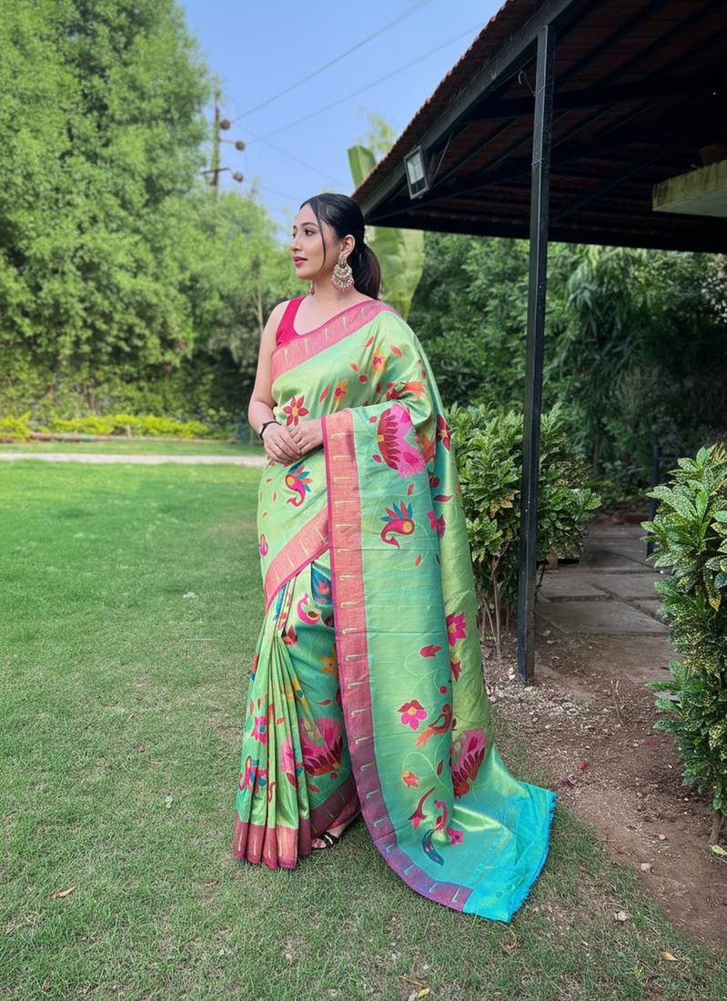 Traditional lemon green silk blend saree with vibrant floral motifs