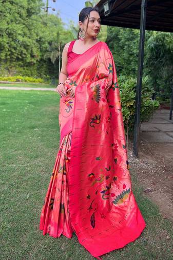 traditional pink silk blend saree with vibrant floral motifs