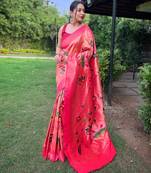 Traditional pink paithani saree with vibrant floral motifs