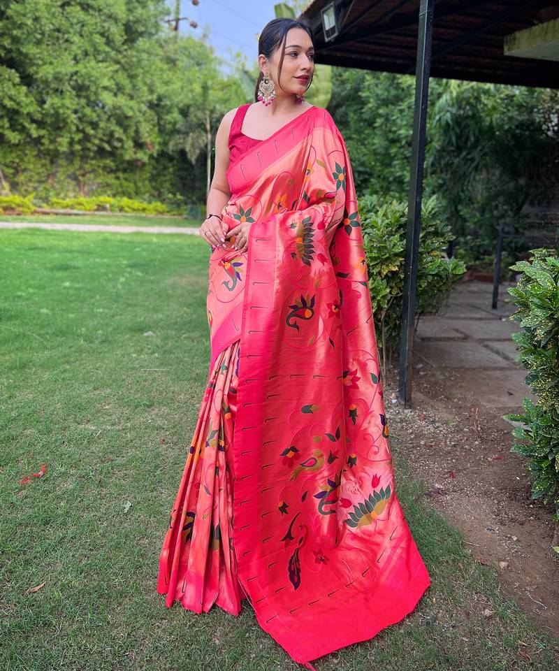 Traditional pink paithani saree with vibrant floral motifs