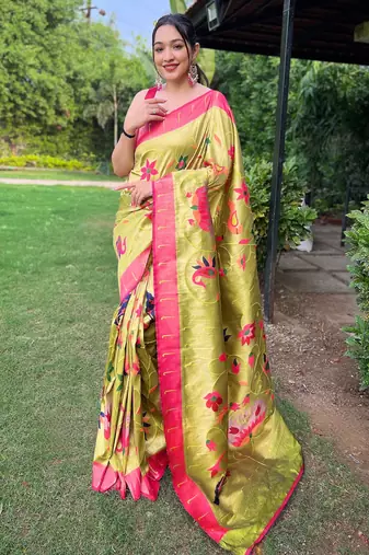 traditional pista green silk blend saree with vibrant floral motifs
