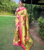 Traditional pista green paithani saree with vibrant floral motifs