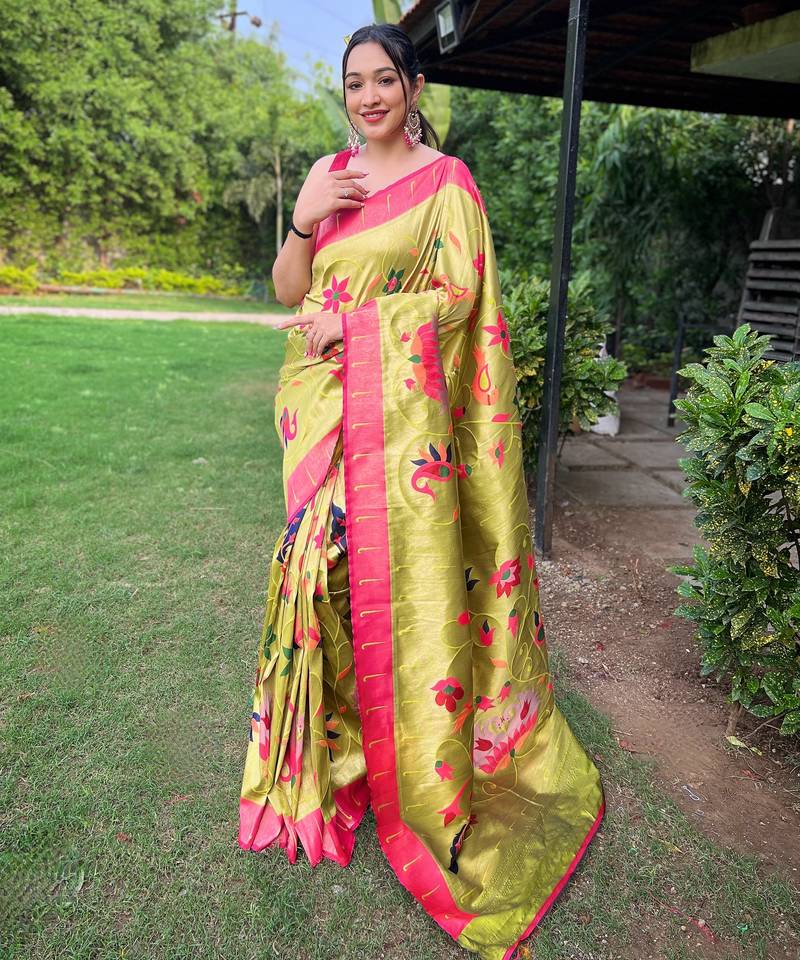 Traditional pista green paithani saree with vibrant floral motifs