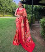 Traditional red paithani saree with vibrant floral motifs