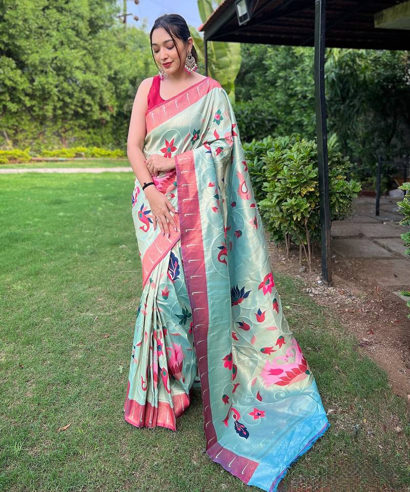 Traditional sky blue slk blend saree with vibrant floral motifs