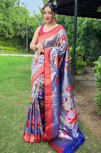 Traditional violet silk blend saree with vibrant floral motifs