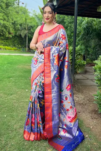 Traditional violet silk blend saree with vibrant floral motifs