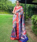 Traditional violet silk blend saree with vibrant floral motifs