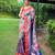 Traditional violet silk blend saree with vibrant floral motifs