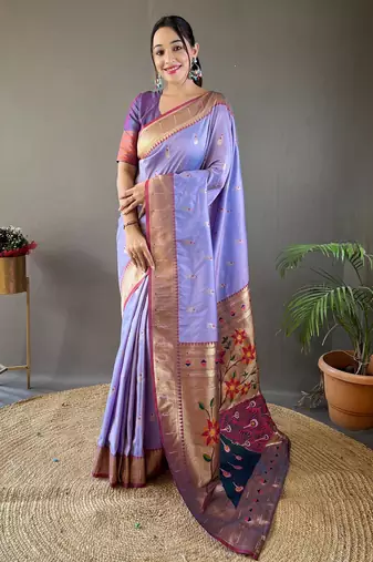 Lavender color silk blend saree with rich contrast weaving pallu & border and beautiful buttis
