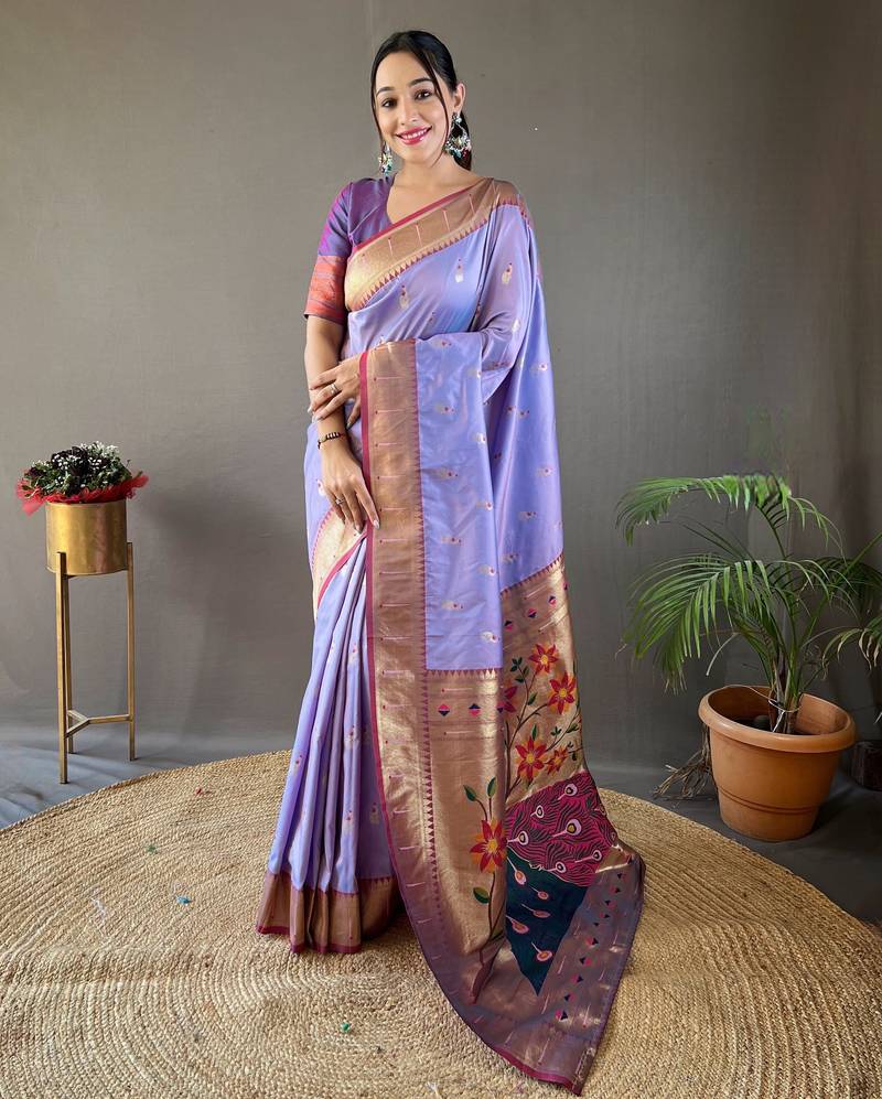 Lavender color silk blend saree with rich contrast weaving pallu & border and beautiful buttis