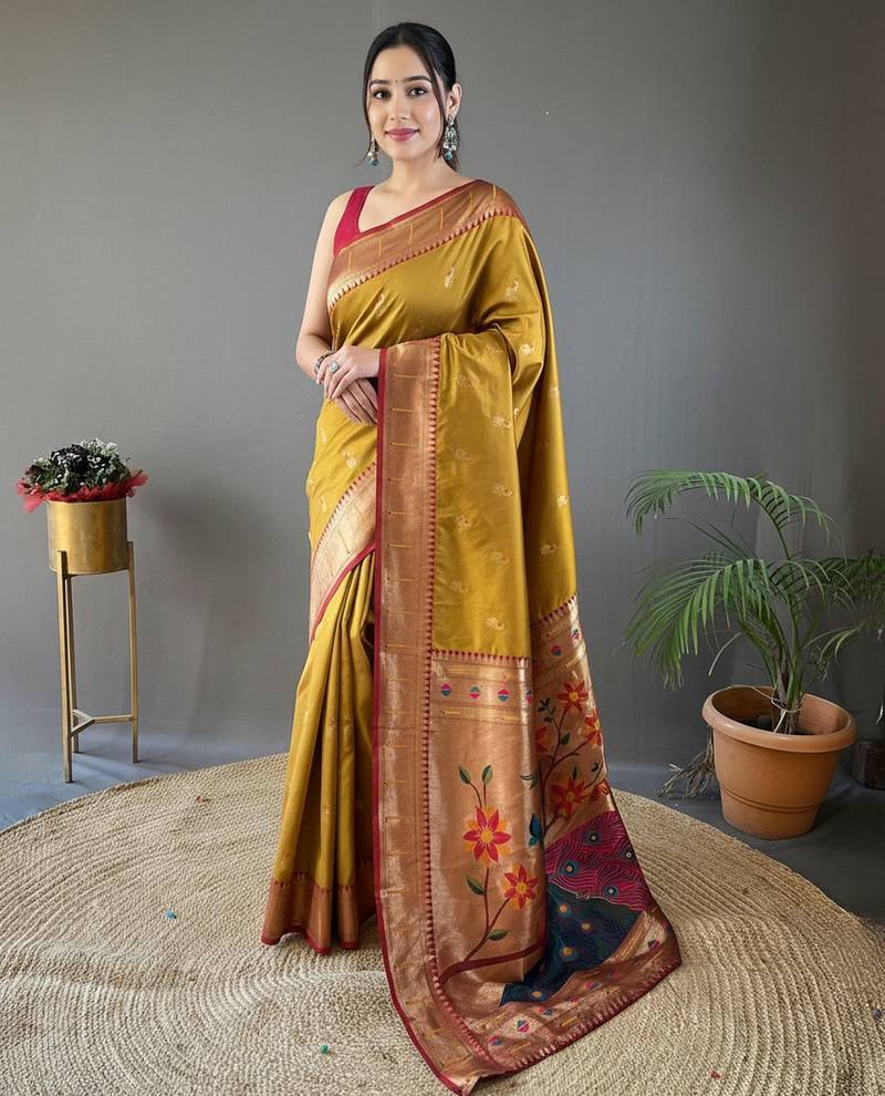Musterd color paithani silk blend saree with rich contrast weaving pallu & border and beautiful buttis