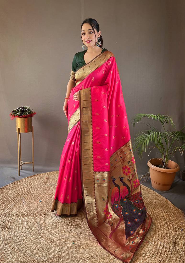 Pink color paithani silk blend saree with rich contrast weaving pallu & border and beautiful buttis