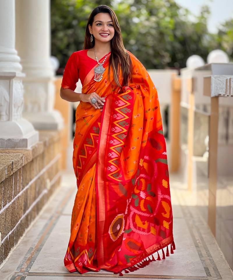 Orange art silk ikkat and patola weaving concept saree & contrast blouse
