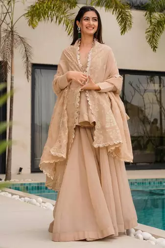 Peach color beautiful designer crunchy fabric graceful ceremonial attire