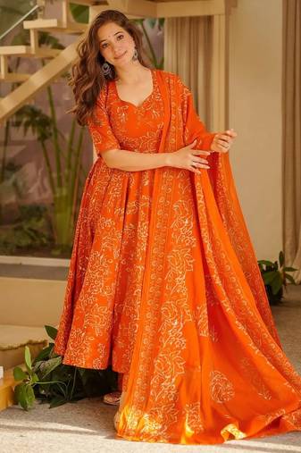 Orange color stylish muslin fabric designer printed ceremonial dress for girls