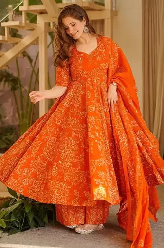 Orange color stylish muslin fabric designer printed ceremonial dress for girls