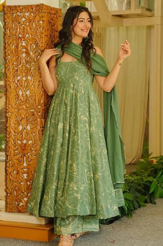 Green color stylish muslin fabric designer printed ceremonial dress for girls