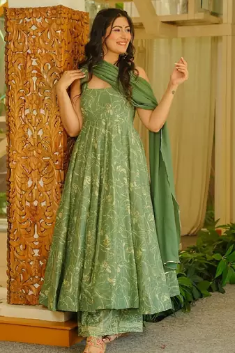 Green color stylish muslin fabric designer printed ceremonial dress for girls