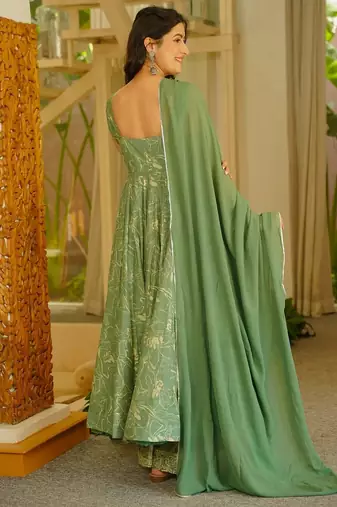 Green color stylish muslin fabric designer printed ceremonial dress for girls