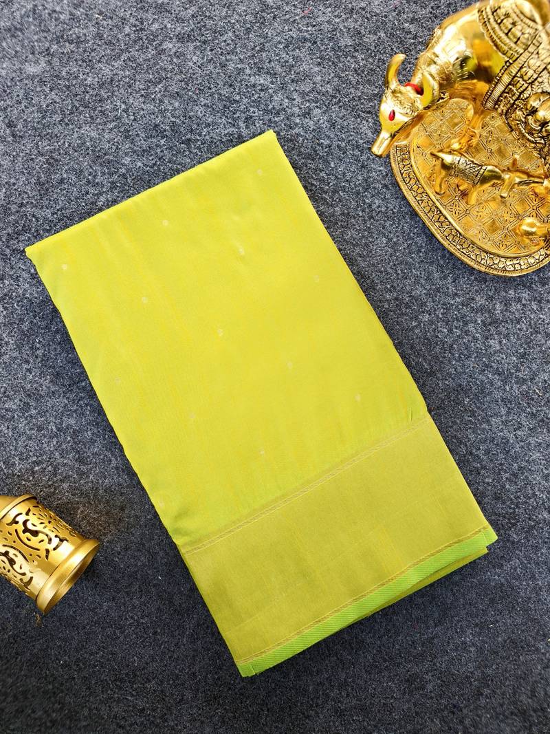 Premium lemon yellow soft silk saree with golden horse motifs