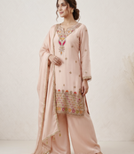 Designer baby pink  festive palazzo suit set with heavy embroidery