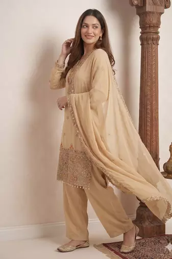 Designer beige  festive palazzo suit set with heavy embroidery