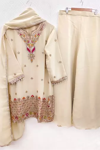 Designer beige  festive palazzo suit set with heavy embroidery