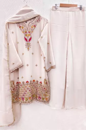 Designer baby pink  festive palazzo suit set with heavy embroidery