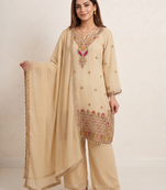 Designer beige  festive palazzo suit set with heavy embroidery
