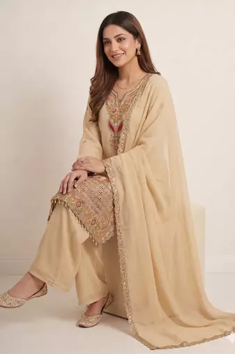 Designer beige  festive palazzo suit set with heavy embroidery