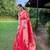 Traditional pink paithani saree with vibrant floral motifs