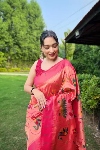 traditional pink silk blend saree with vibrant floral motifs