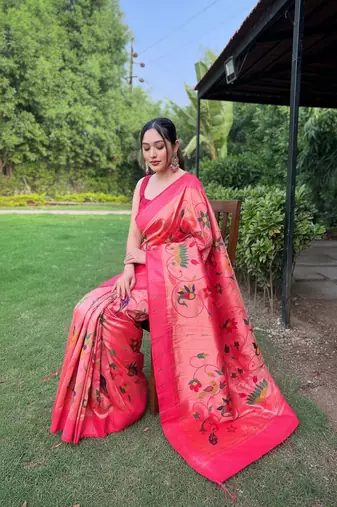 traditional pink silk blend saree with vibrant floral motifs