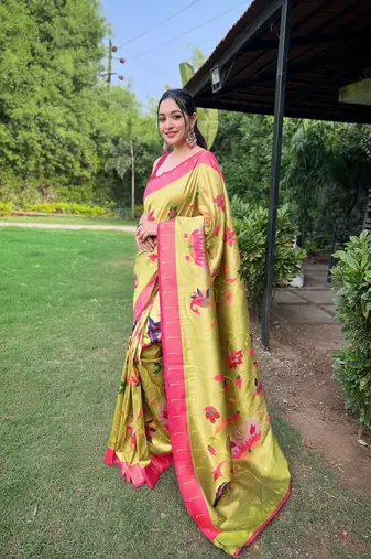 traditional pista green silk blend saree with vibrant floral motifs