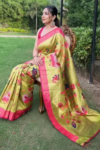 traditional pista green silk blend saree with vibrant floral motifs