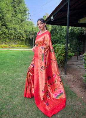 traditional red silk blend saree with vibrant floral motifs 2