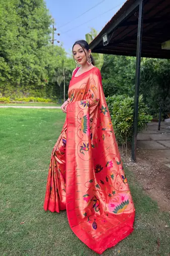 traditional red silk blend saree with vibrant floral motifs
