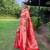 Traditional red paithani saree with vibrant floral motifs