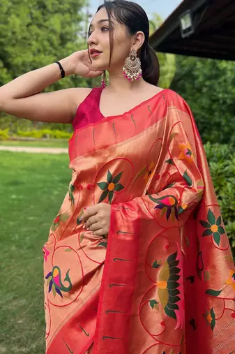 traditional red silk blend saree with vibrant floral motifs