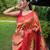 Traditional red paithani saree with vibrant floral motifs