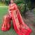 Traditional red paithani saree with vibrant floral motifs