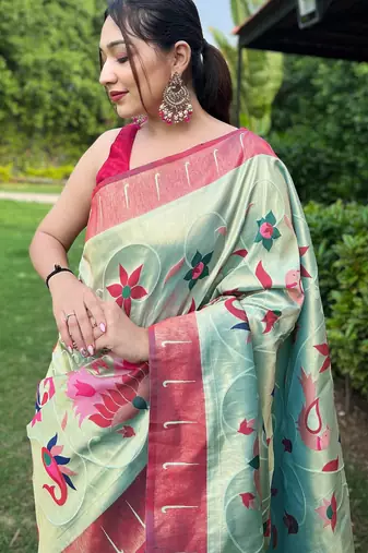 Traditional sky blue slk blend saree with vibrant floral motifs