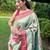 Traditional sky blue slk blend saree with vibrant floral motifs