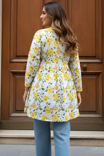 Yellow color beautiful sophisticated graceful formal short kurta for girls