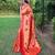 Traditional orange paithani saree with vibrant floral motifs