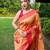 Traditional orange paithani saree with vibrant floral motifs