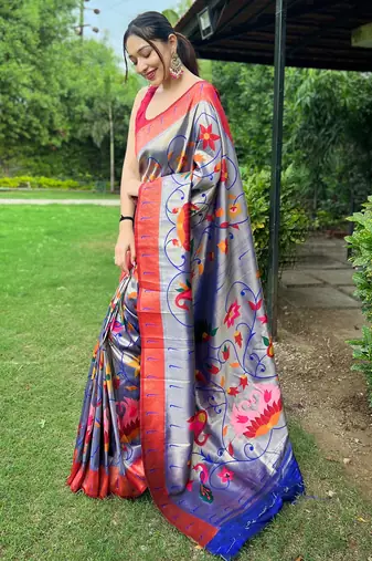 Traditional violet silk blend saree with vibrant floral motifs