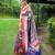 Traditional violet silk blend saree with vibrant floral motifs